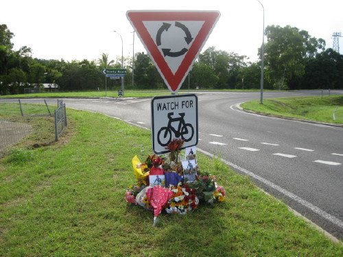 FLORAL TRIBUTES AT SCENE OF AN EARLIER BICYCLE FATALITY - COURTESY www.cairnsbug.org