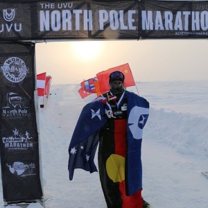 Adrian celebrates his historic North Pole Marathon
